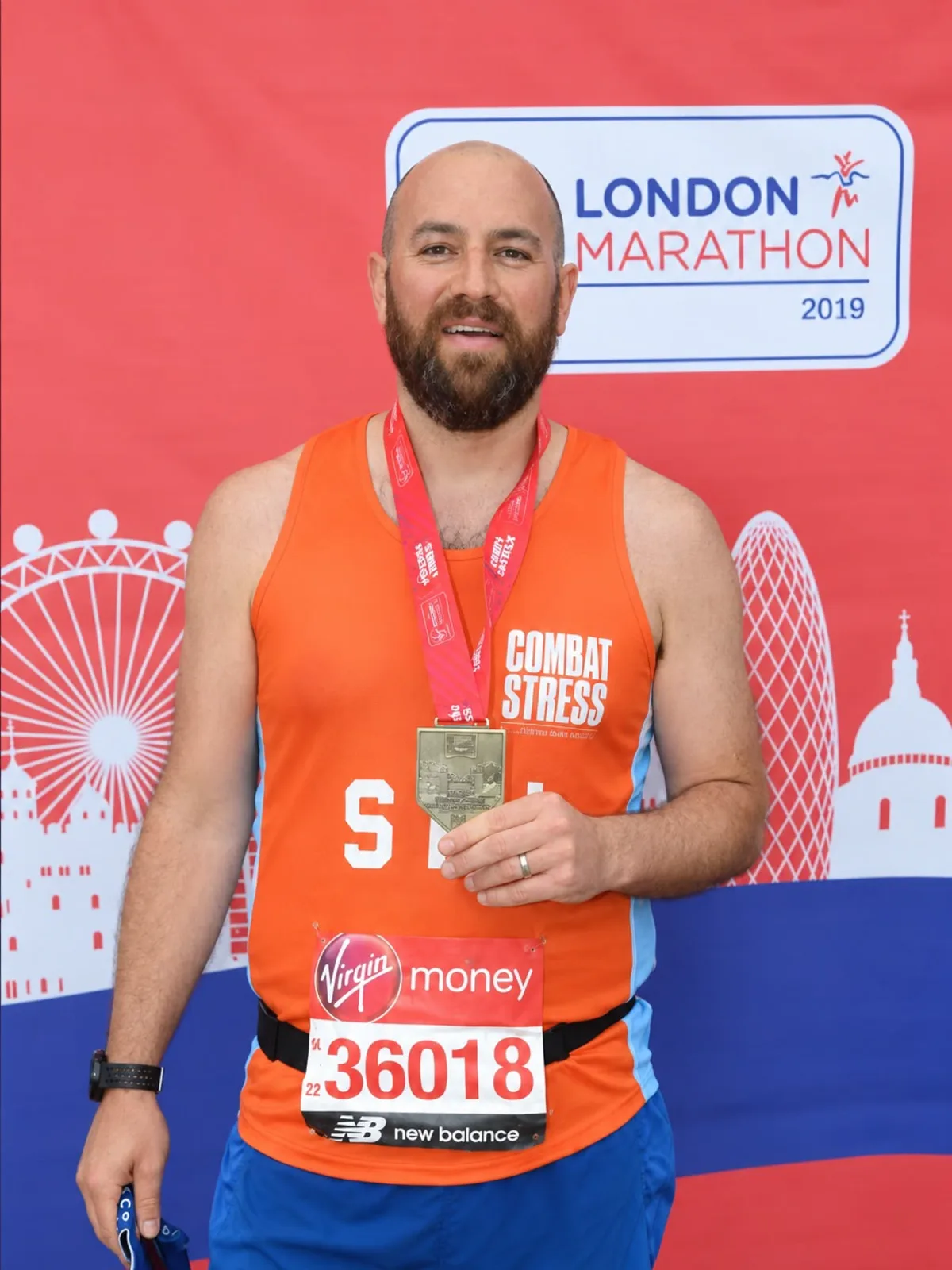 SpeedPro assistant coach Stu Barnes with his 2019 London Marathon finisher medal