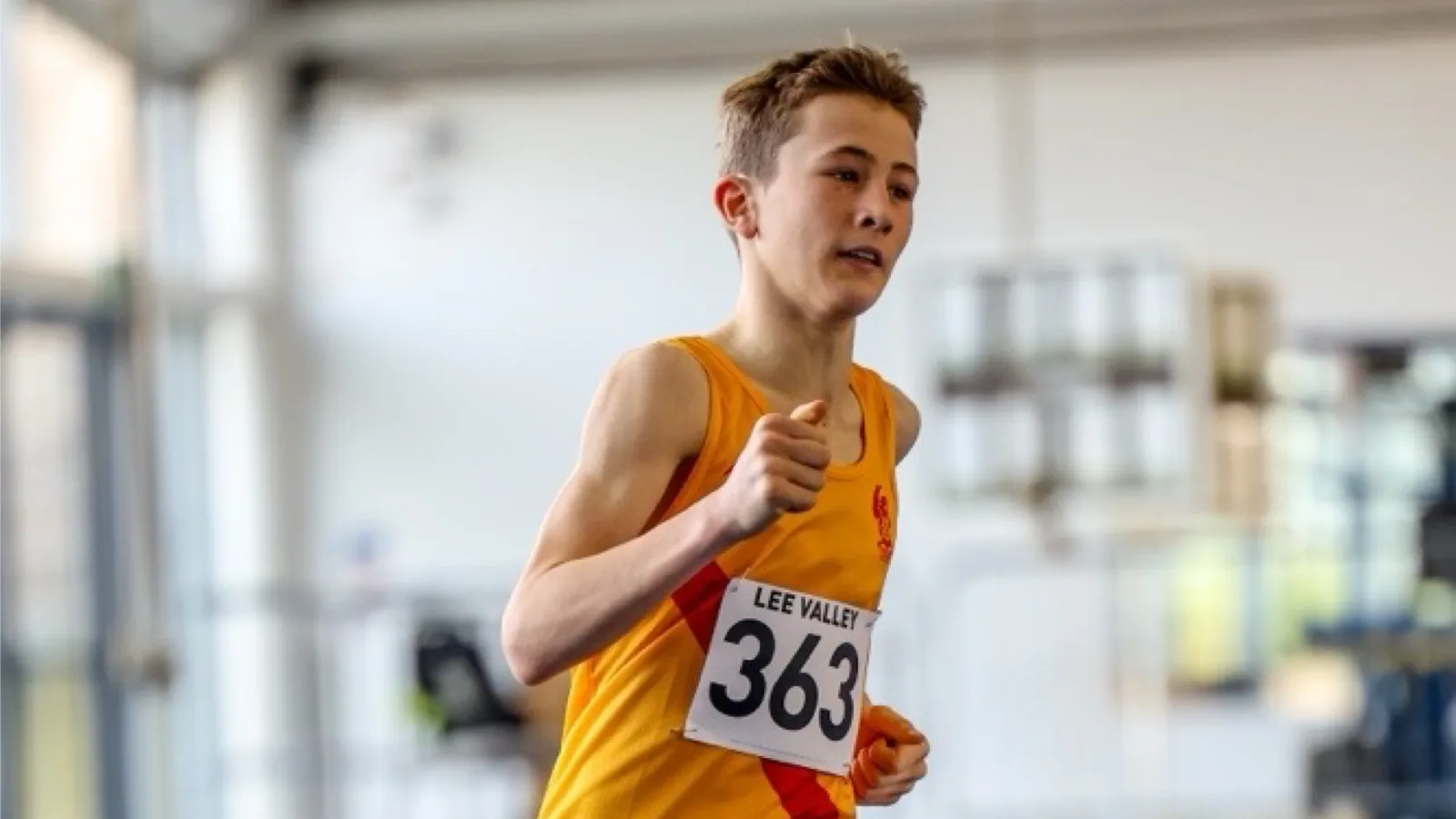 SpeedPro athlete Thomas Whorton, number 363, racing on the indoor track