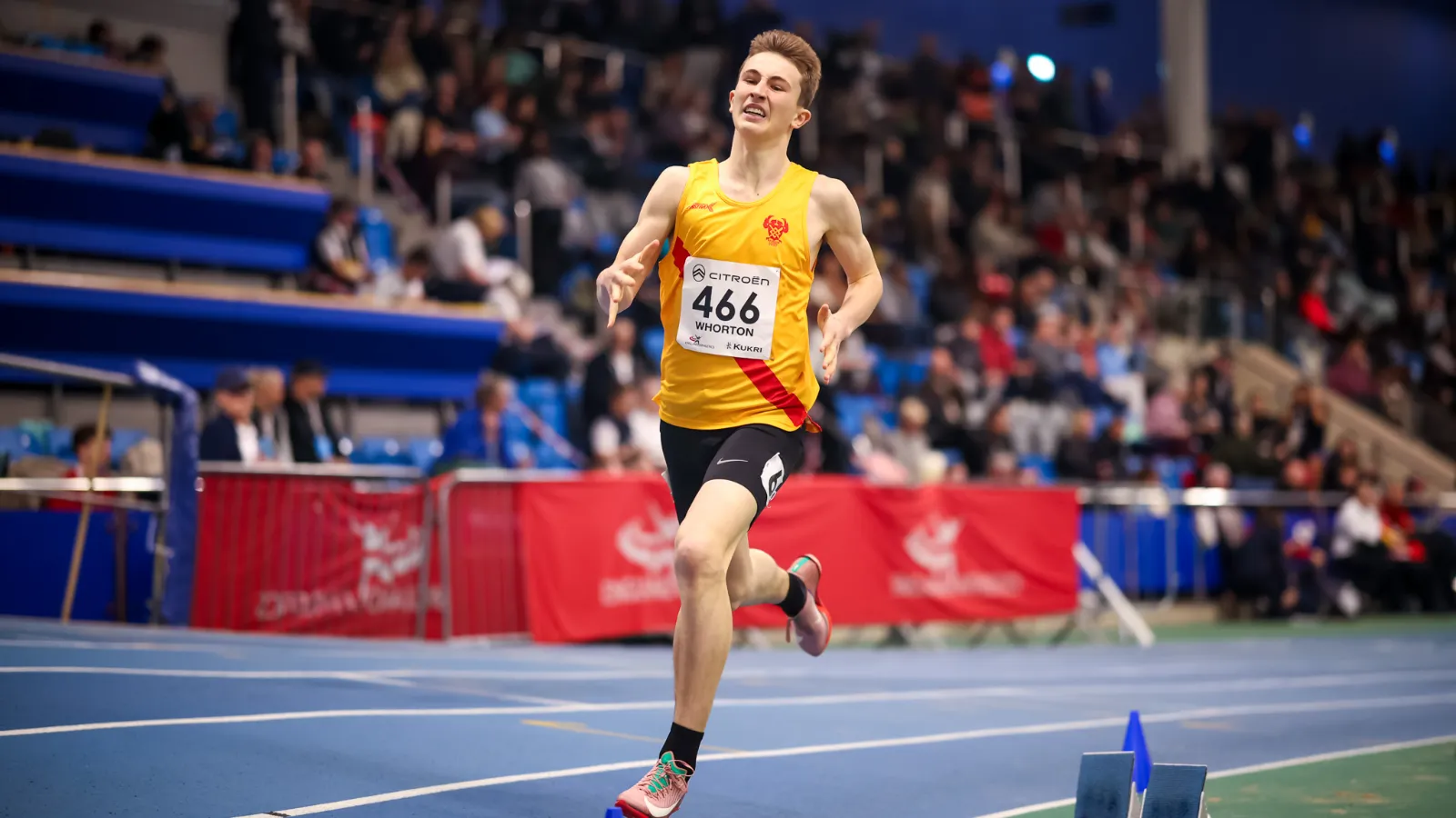 SpeedPro athlete Thomas Whorton, number 466, driving for the line in the U17 800m final at the Indoor National Championships